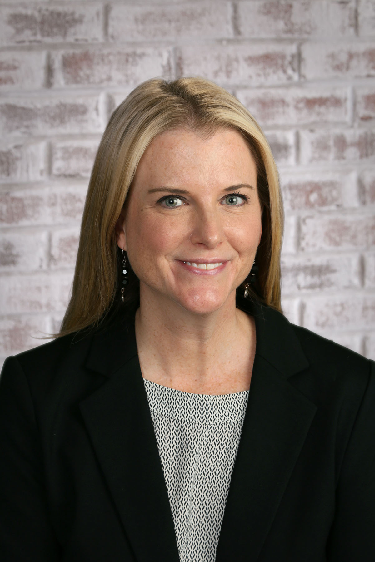 Jennifer Fuller a woman smiling for the camera