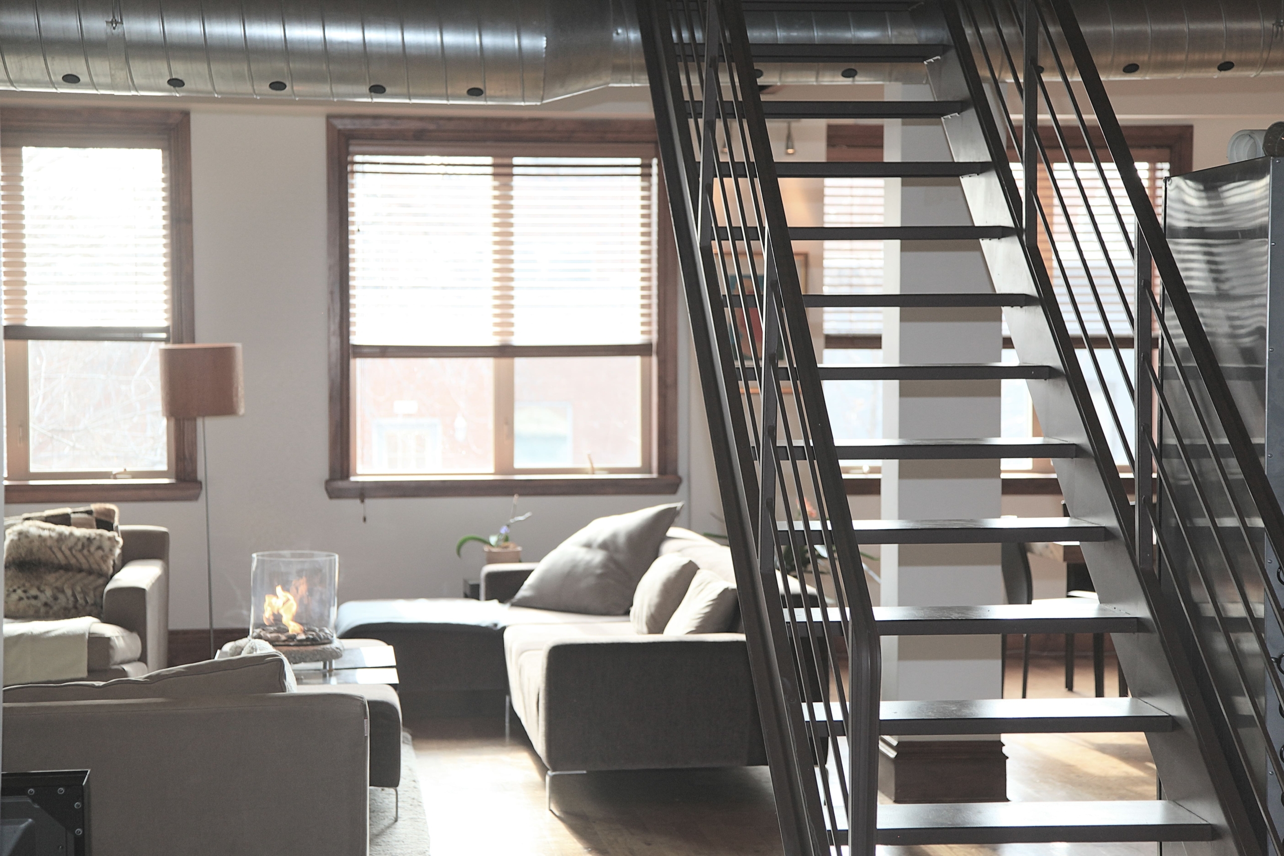 a living room with a staircase