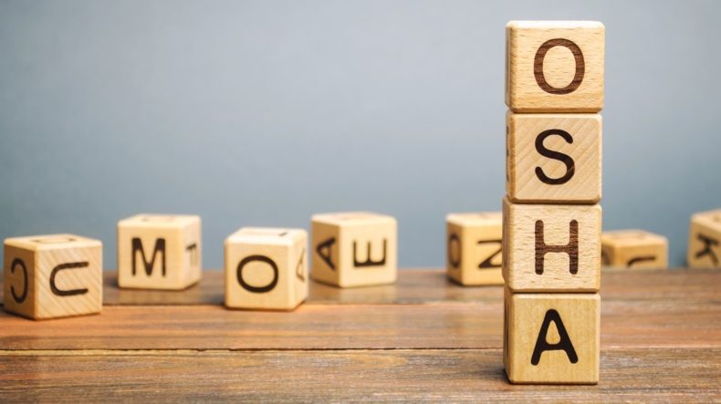 OSHA formed by letter blocks in front of other letter blocks in disarray